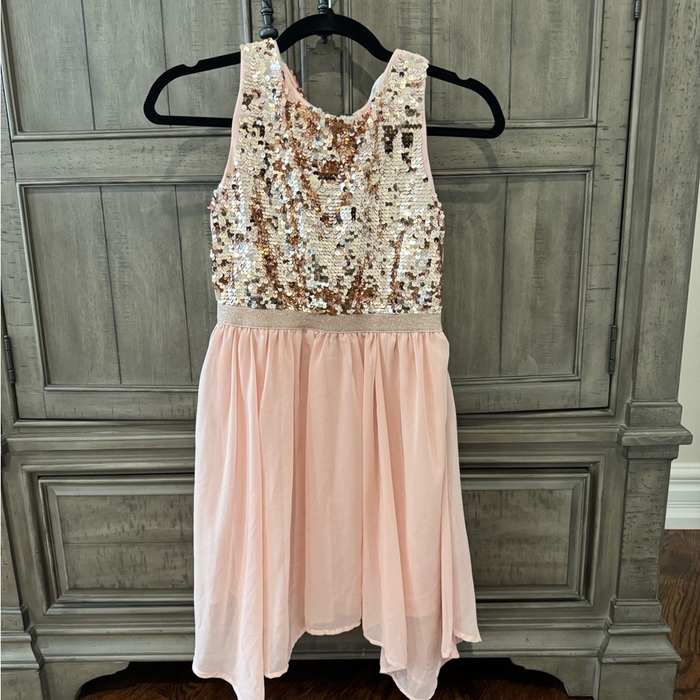 H & M sequined dress. New. Size 10-11